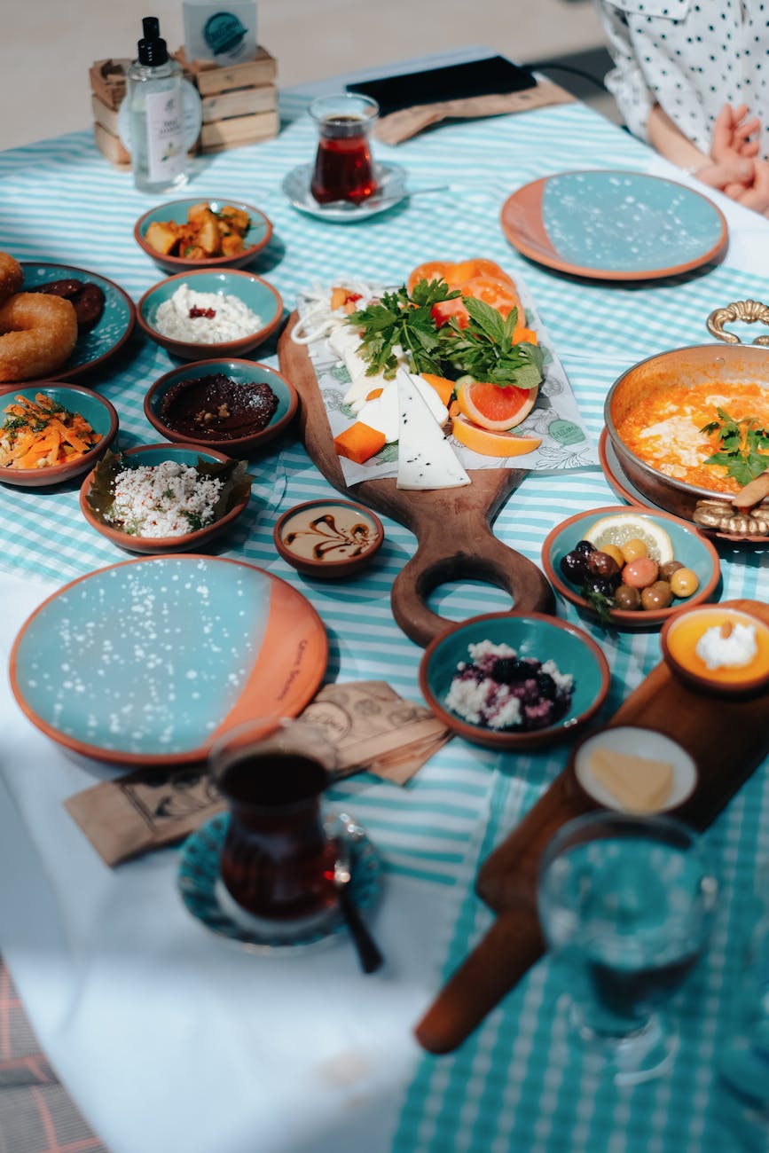 plates and bowls with food on table