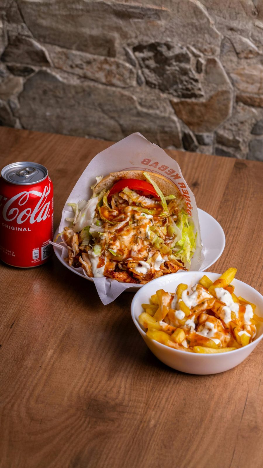 Delicious doner kebab with fries and cola
