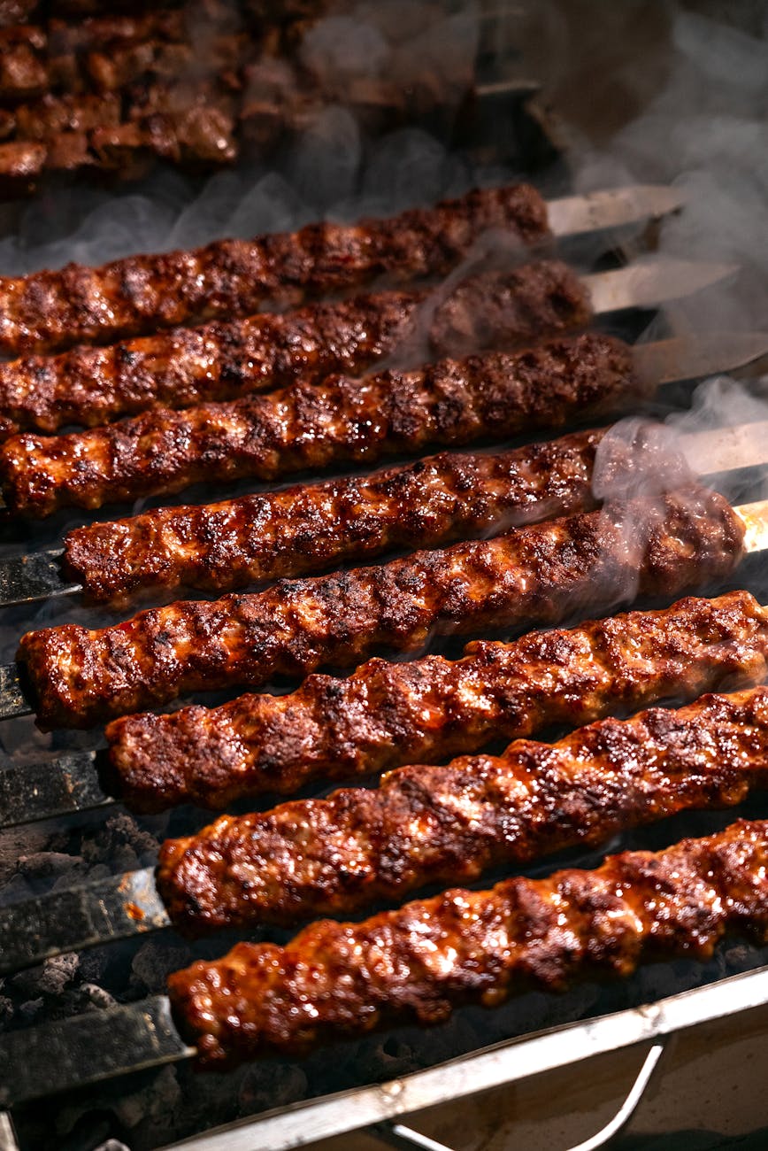 juicy grilled kebabs on outdoor barbecue