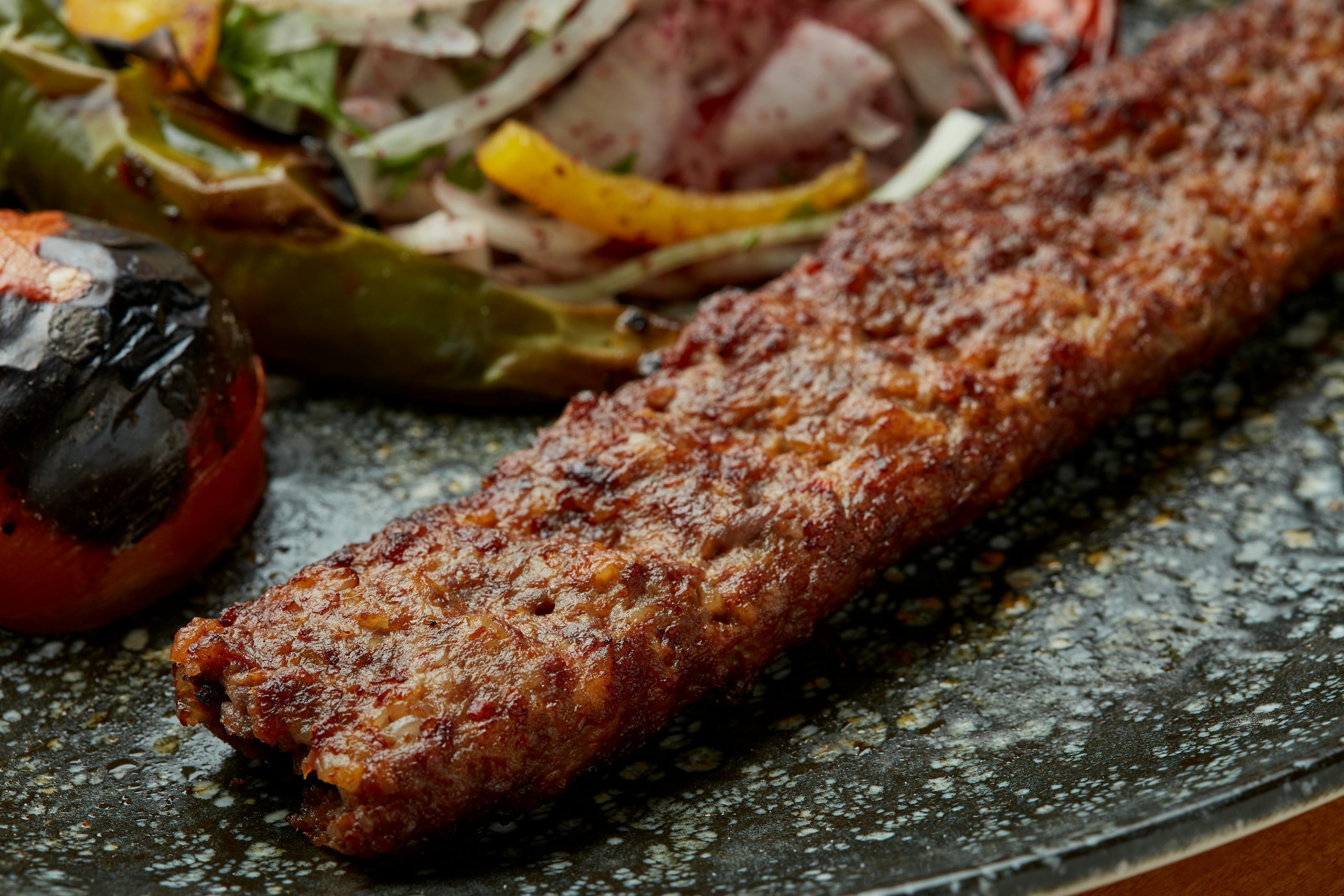 Delicious grilled kebab with roasted vegetables