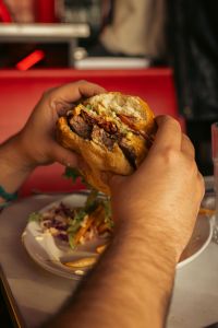 Delicious hamburger enjoyed in buenos aires cafe