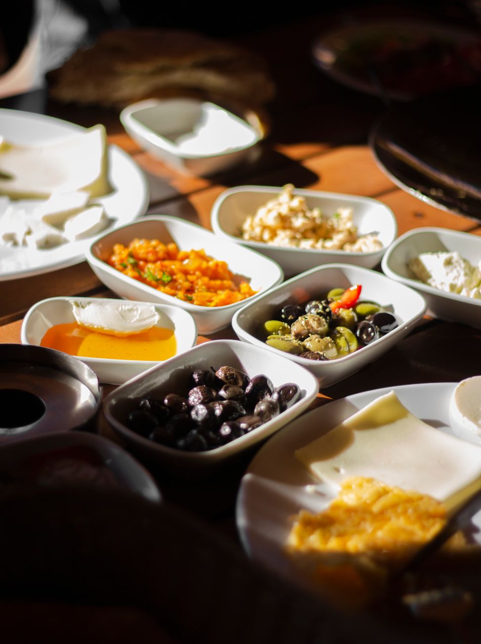 close up of variety of foods in bowls on a table